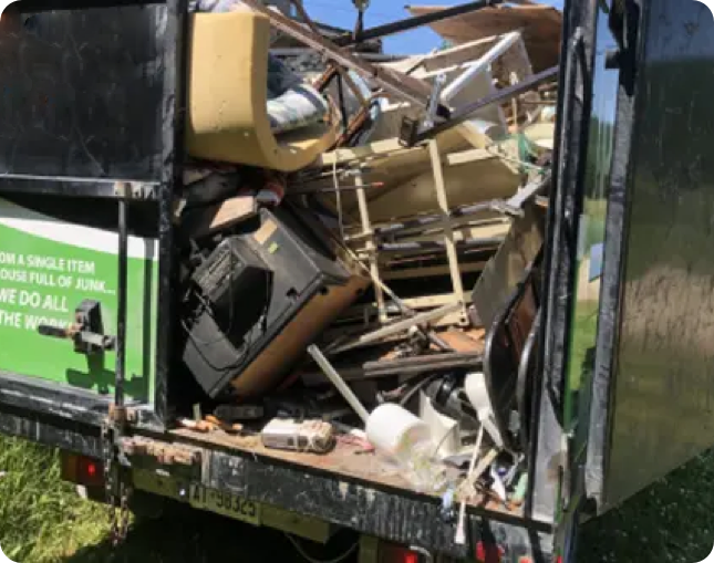 Junk Ninja truck full of old junk and garbage